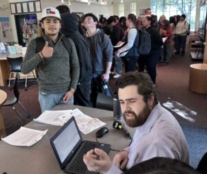 The line for Chromebooks. Photo by Robert Eliason.