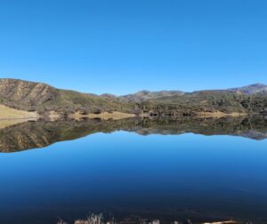 The earthen Hernandez Dam holds back 18,000-acre feet of water in the reservoir. Photo courtesy of SBCWD.