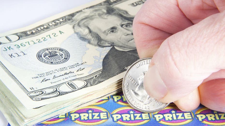 Man uses coin to reveal scratch prize on lottery ticket
