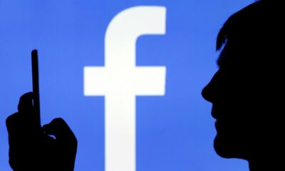 Facebook Logo with the silhouette of an unknown man