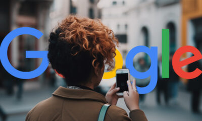 Woman Messaging On Street Google Logo