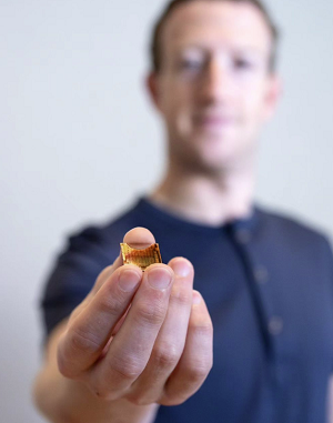 Mark Zuckerberg holding a Meta AI chip