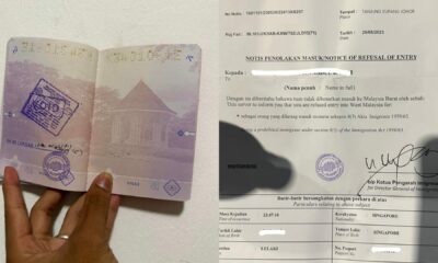 Singaporean couple banned from Malaysia after challenging passport stamping procedures