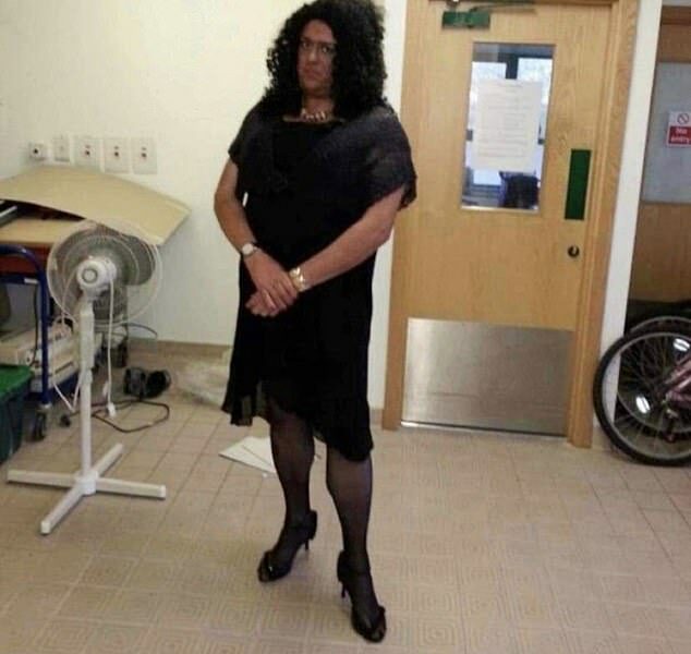 In the 2013 image, Jim Hobson, 53, seems to be wearing make-up to darken his face, a black wig, black dress, tights and stiletto shoes