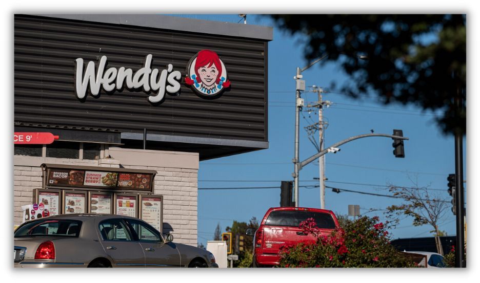 wendys drive thru window with cars