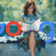 Woman Park Bench Reading Paper Google Logo