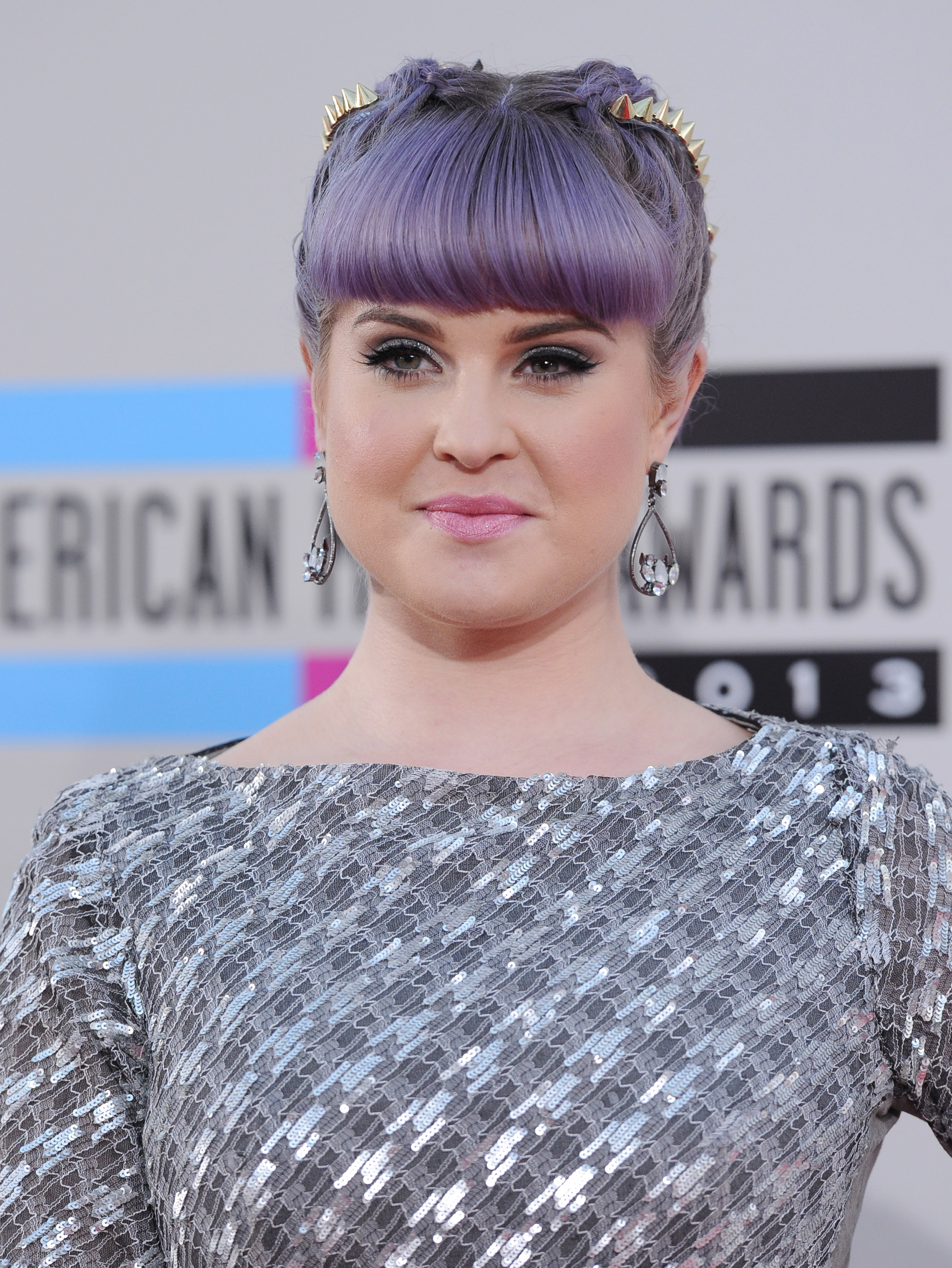 Kelly Osbourne making her entrance at Nokia Theatre L.A. Live during the 2013 American Music Awards on November 24, 2013, in Los Angeles, California | Source: Getty Images