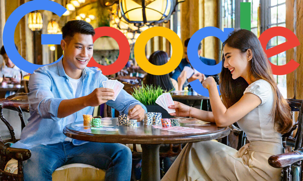 Couple Playing Cards At A Table In A Busy Restaurant Google Logo
