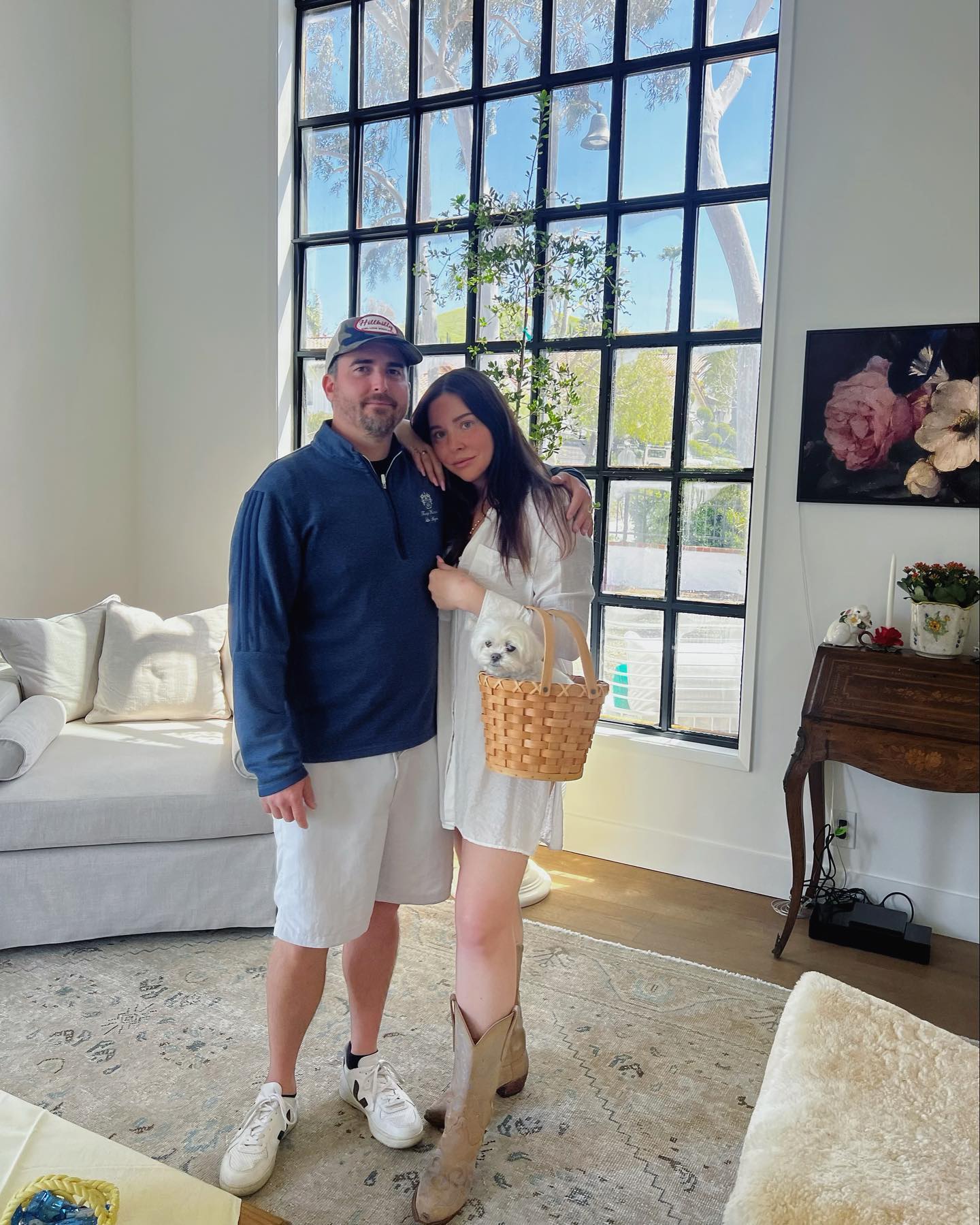 Alexandra Peirce poses with her husband, Jason Locke, and her dog, Ming, for a photo on Instagram