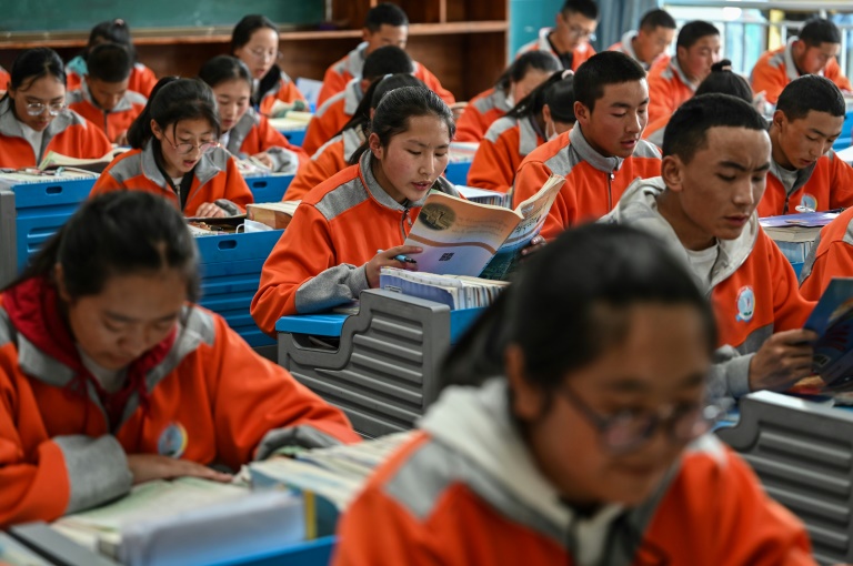 Students are seen in a classroom at the Lhasa Nagqu Second Senior High School in the Tibetan regional capital Lhasa during a government-organized media tour in June 2021