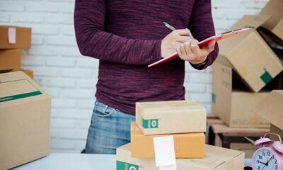 Man checking his product logistics before delivery to customers.