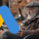Old Man Reading News Park Bench Google Ads Logo