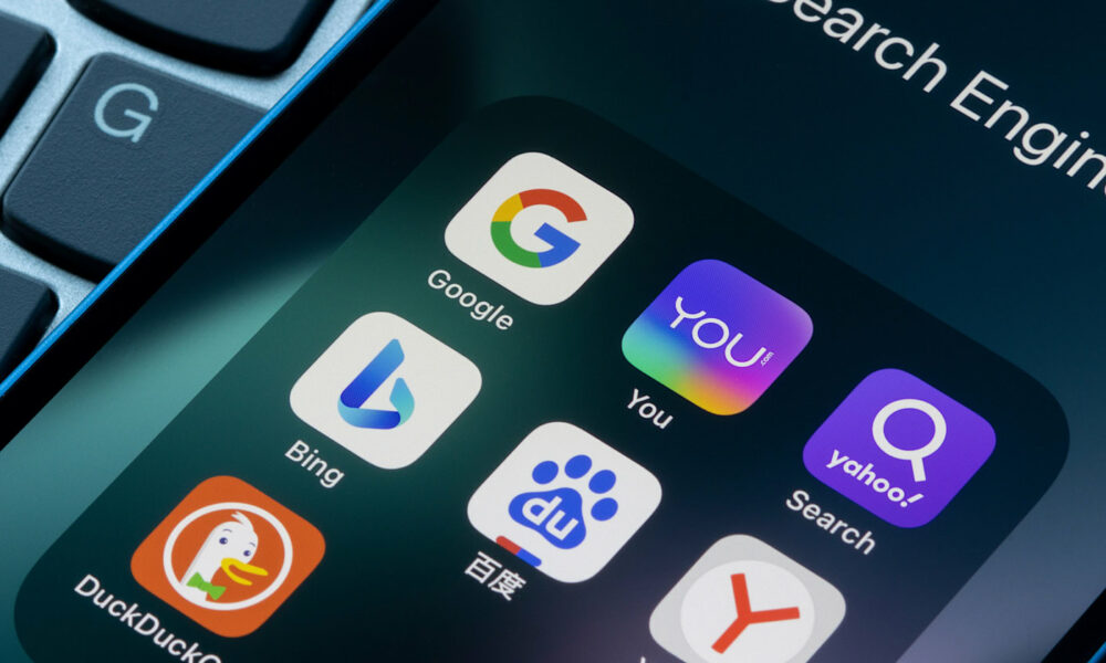 Assorted search engine apps including Google, You.com and Bing are seen on an iPhone. Microsoft plans to use ChatGPT in Bing, and You.com has launched an AI chatbot.